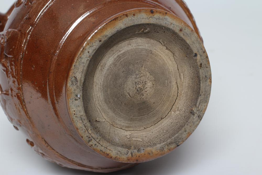 A VICTORIAN BROWN SALT GLAZED STONEWARE PUZZLE JUG of typical form with three spouts, the sprigged - Image 3 of 3