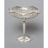 A HIGH PEDESTAL SILVER TAZZA, maker Adie Bros., Sheffield 1912, the shallow dished bowl with pierced