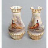 A PAIR OF ROYAL WORCESTER CHINA VASES, 1905/6, of baluster form with arcade moulded base and pierced