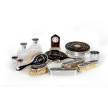 AN EXTENSIVE COMPOSITE TORTOISESHELL PIQUE WORK SILVER DRESSING TABLE SET, maker Walker & Hall,