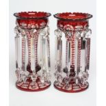 A PAIR OF BOHEMIAN GLASS LUSTRES, late 19th century, of typical form with red flashing cut through