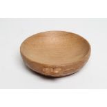 AN ADZED OAK NUT BOWL BY ROBERT THOMPSON, the shallow bowl with carved mouse trademark in high