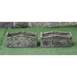 A PAIR OF "WILLOWSTONE" CAST PLANTERS of oblong form with arched trellis patterned sides, 24" x 9