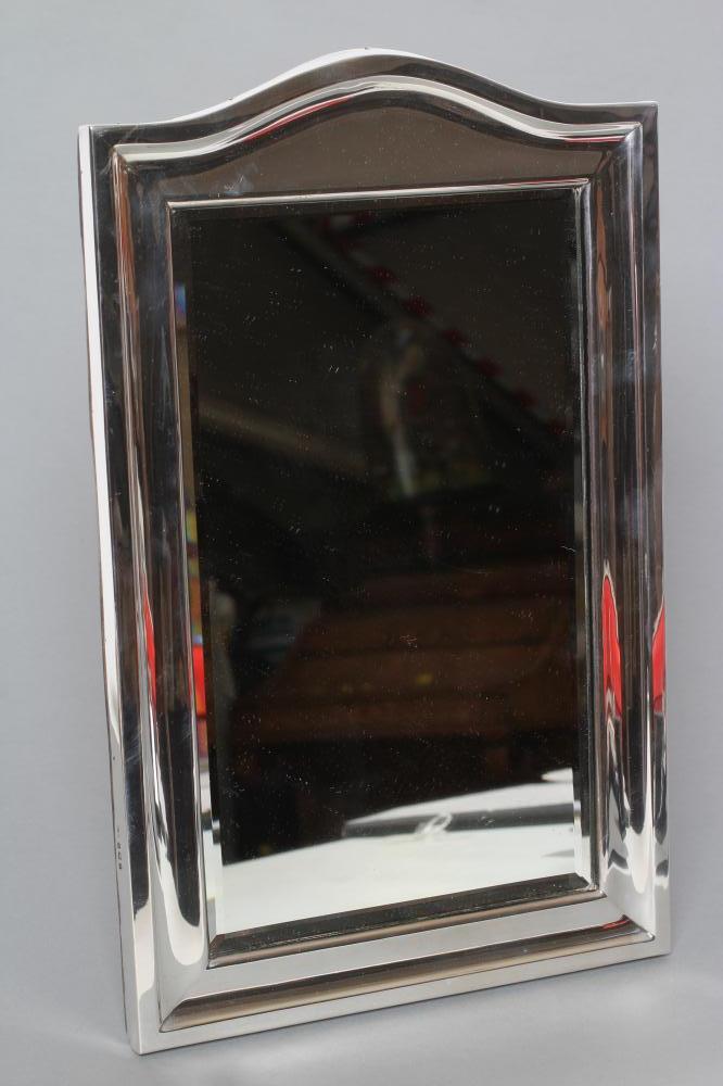 AN EDWARDIAN SILVER EASEL BACK MIRROR, maker's mark HM, Birmingham 1908, the vertical oblong