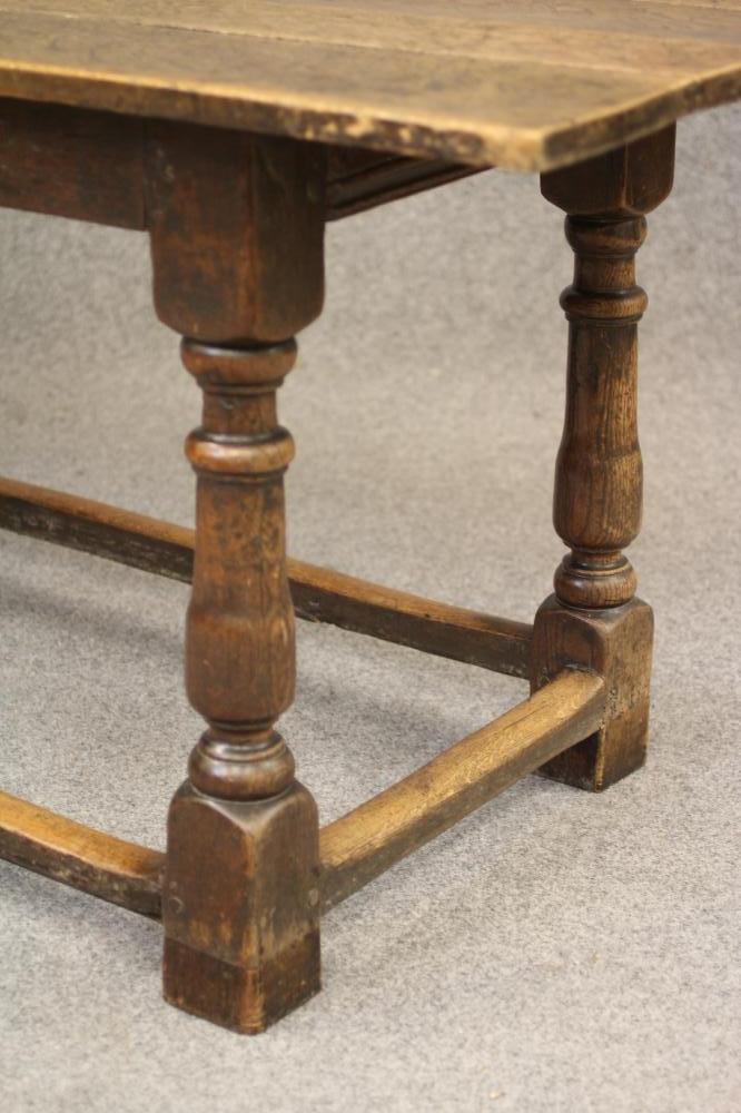 A JOINED OAK DINING TABLE, late 17th century and later, the associated three plank top on moulded - Image 3 of 4