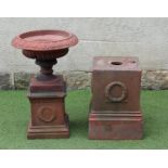 A VICTORIAN TERRACOTTA URN, the shallow fluted bowl with ovolo moulded rim, on fluted socle and