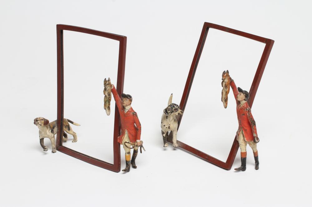 A PAIR OF COLD PAINTED METAL MENU/PHOTOGRAPH FRAMES, c.1920's/30's, each vertical oblong frame