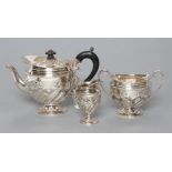 A LATE VICTORIAN SILVER THREE PIECE TEA SERVICE, maker Aldwinkle & Slater, London 1891 and 1893 (