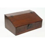 A GEORGIAN OAK BOARDED DESK BOX, the fascia carved with initials "AT" and dated "1758", the
