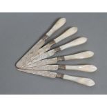 A SET OF SIX VICTORIAN SILVER DESSERT KNIVES, maker Belk & Parkin, Sheffield 1883, with strapwork