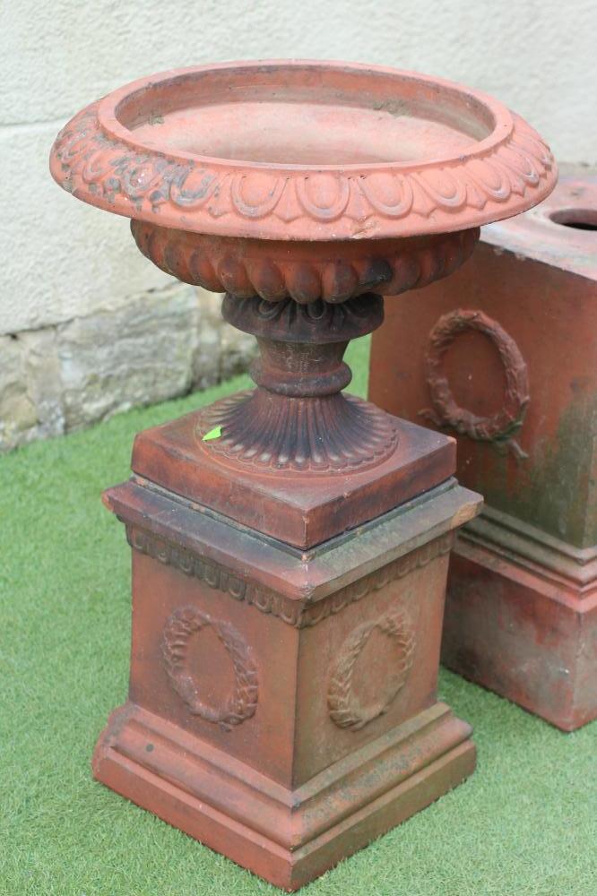 A VICTORIAN TERRACOTTA URN, the shallow fluted bowl with ovolo moulded rim, on fluted socle and - Image 2 of 3