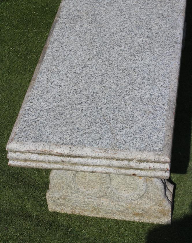 A GRANITE BENCH, the moulded edged oblong seat on shaped end supports each with a heart motif, - Bild 2 aus 4