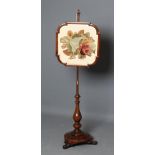 A VICTORIAN ROSEWOOD POLE SCREEN, the square shield with incurved corners and glazed gros point