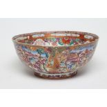 A CHINESE EXPORT PORCELAIN PUNCH BOWL painted in famille rose enamels with panels of figures,