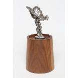 A SPIRIT OF ECSTASY CAR MASCOT, with hinged base and stamped "ROLLS-ROYCE MOTORS LIMITED", on