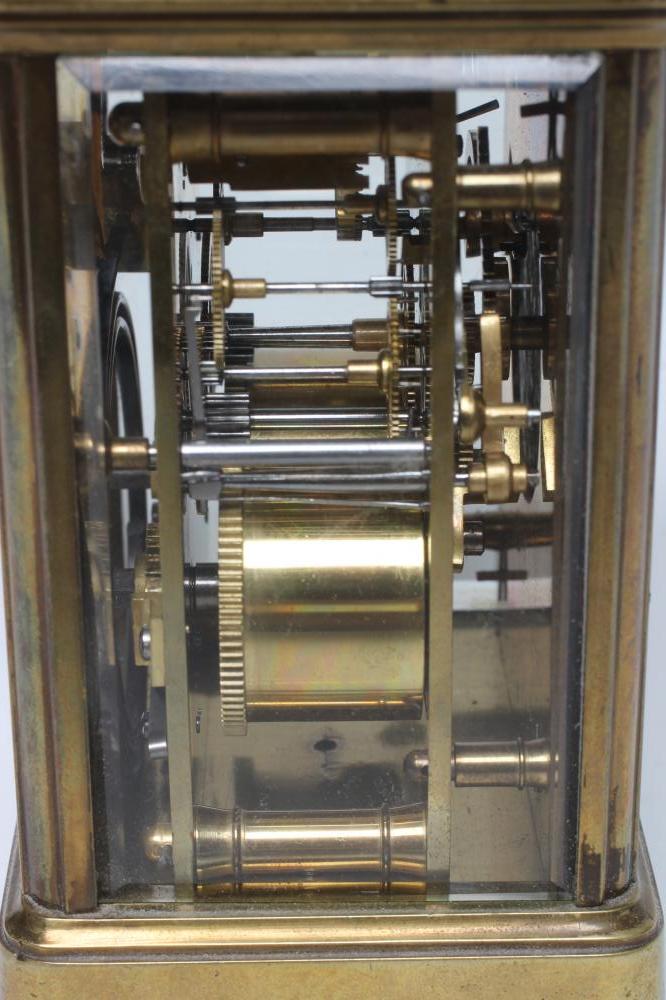 A BRASS CASED CARRIAGE CLOCK, the twin barrel movement with platform escapement striking on a - Image 3 of 4