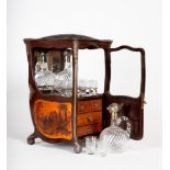 A FRENCH NOVELTY LIQUEUR CABINET, modelled as a leather covered sedan chair, the sides and hinged