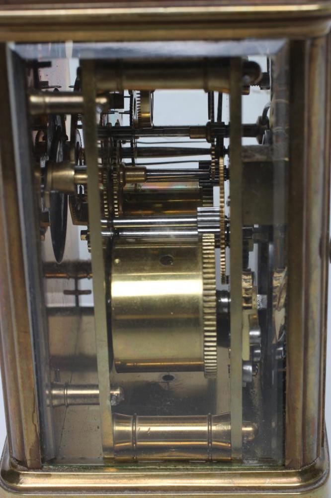 A BRASS CASED CARRIAGE CLOCK, the twin barrel movement with platform escapement striking on a - Image 4 of 4