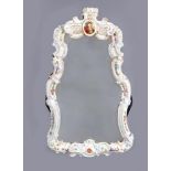 A LARGE GERMAN PORCELAIN MIRROR FRAME, mid 19th century, the typical rococo scrolls encrusted with