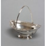 A GEORGE III SWEETMEAT BASKET, maker's mark rubbed, London 1796, of eliptical form, reeded