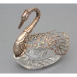 A SILVER MOUNTED CUT GLASS SWAN POSY HOLDER, London import mark 1962, with typical chased neck and
