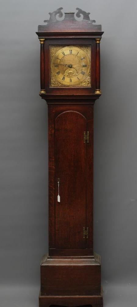 AN OAK LONGCASE CLOCK by John Edwards, Norwich, the thirty hour lantern movement with anchor