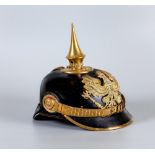 AN IMPERIAL GERMAN PICKELHAUBE HELMET, with brass top spike, Prussian eagle badge, brass chain
