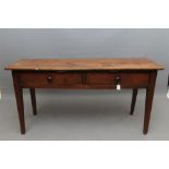 AN OAK KITCHEN SIDE TABLE, early/mid 19th century, the rounded oblong plank top over two frieze