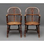 A PAIR OF VICTORIAN WINDSOR ARMCHAIRS in ash and elm, of low hoop back form with shaped and