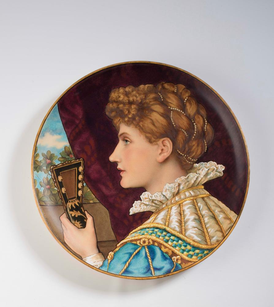 A MINTON EARTHENWARE ARTS AND CRAFTS PLAQUE, 1876, of plain shallow dished circular form painted