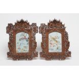 A PAIR OF CANTONESE SOFTWOOD WALL HANGING FRAMES, 19th century, of vertical arched oblong form,