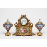 A FRENCH GILT METAL AND PORCELAIN MANTEL CLOCK, 19th century, the twin barrel movement with 3 1/4"