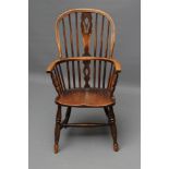 AN ASH AND ELM WINDSOR ARMCHAIR, 19th century, of high hoop back form with shaped and pierced splat,