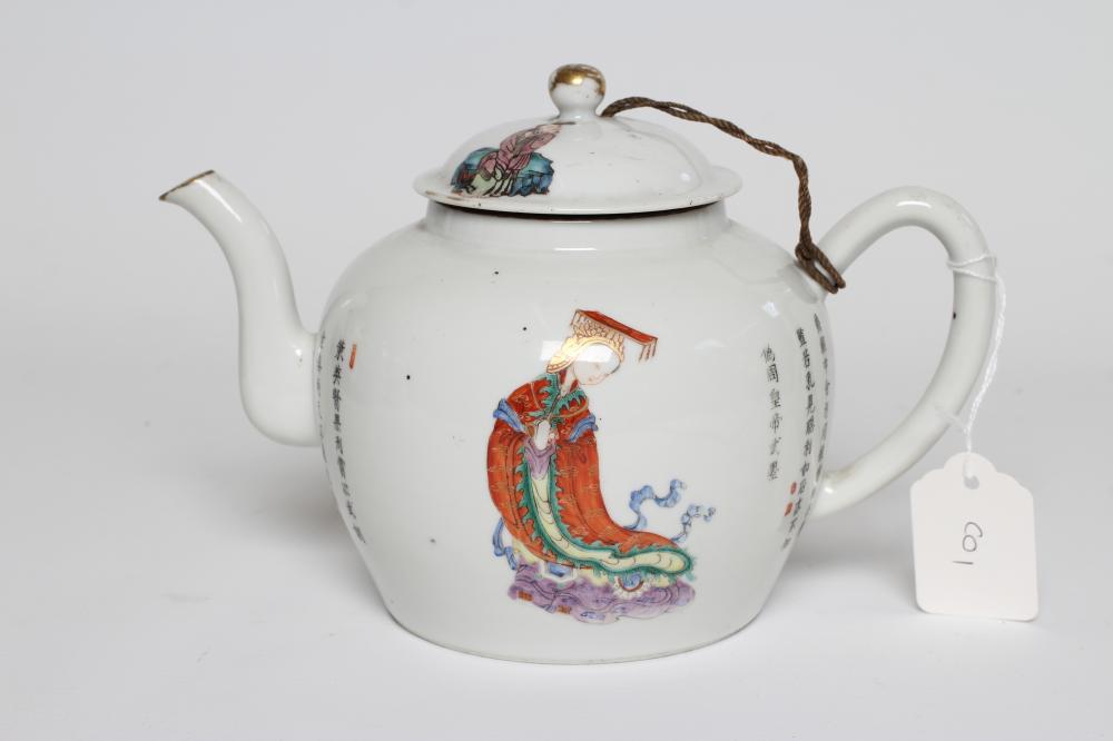 A CHINESE PORCELAIN TEAPOT AND COVER of rounded cylindrical form, painted in coloured enamels with a