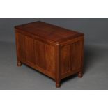 AN ALBERT JEFFRAY ADZED OAK PANELLED CHEST of canted oblong form with hinged plank lid, four