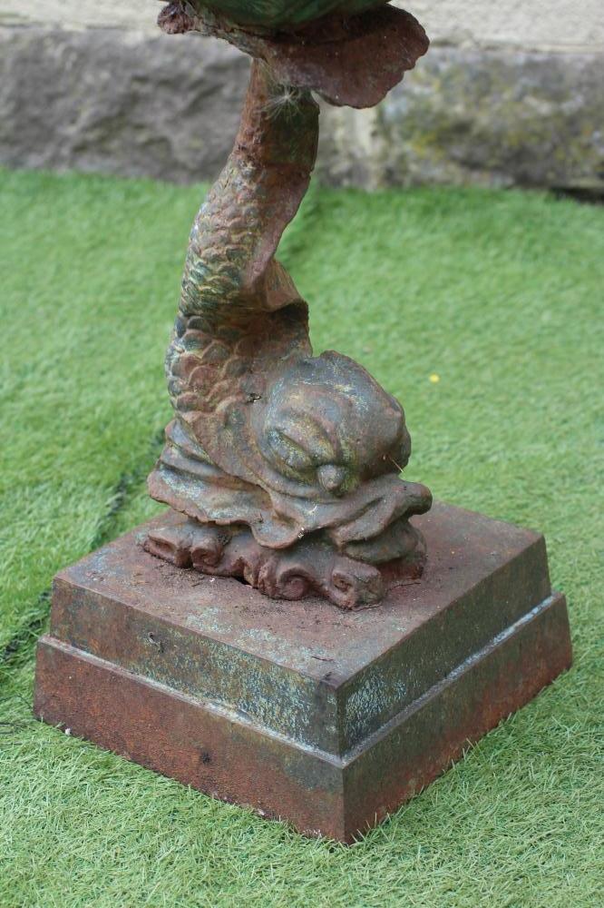 A CAST IRON PLANTER modelled as a dolphin supporting a scallop shell, raised on moulded square base, - Image 2 of 2
