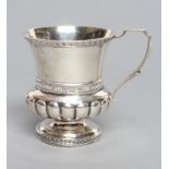 A GEORGE III SILVER CHRISTENING MUG, maker Charles Fox, London probably 1781, of semi fluted