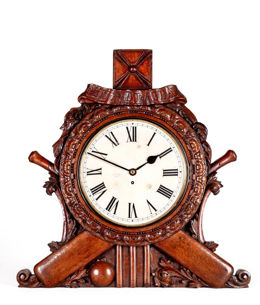 A VICTORIAN CRICKET THEMED OAK CASED WALL TIMEPIECE with single fusee movement, the 12" white enamel