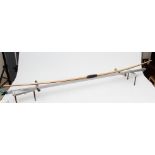 A BICKERSTAFFE LONG BOW, of laminated form with horn tips and leather grip, BH: 6 1/2" MAX, DL: