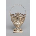 A GEORGE III SUGAR BASKET, marks stamped through, with spectacle cast overhead swing handle, the