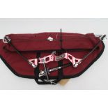 A HOYT INTENSITY COMPOUND BOW, with laminated grips, toxonics model 3515 sight, carrying case,