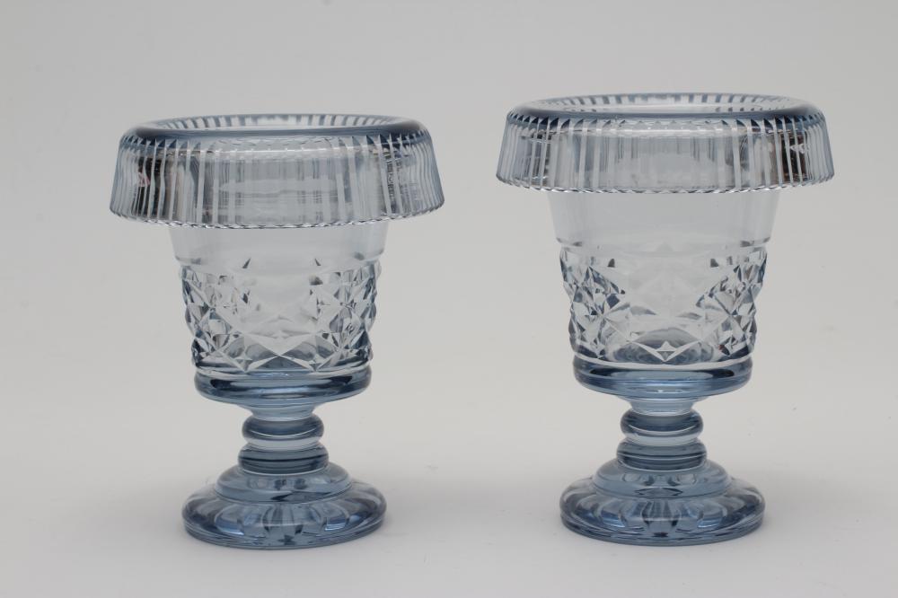 A PAIR OF BLUE/GREY GLASS URNS, 20th century, of flared cylindrical form with deep everted slice cut