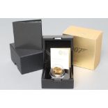 AN ELIZABETH II 007 "SHAKEN NOT STIRRED" 1/4 OZ GOLD PROOF COIN, 2020, in capsule, cased and boxed