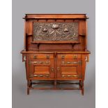 AN ARTS AND CRAFTS STYLE MAHOGANY SIDEBOARD, the raised back with large central copper panel