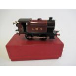 Hornby Trains clockwork 101 tank finished in L.M.S. red, some ageing to paint finish, boxed, G (Est.
