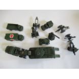 Playworn Dinky military vehicles including tank transporter and tank, and Britains field guns, P (