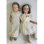 Two small dolls, comprising a 13 1/2" SFBJ bisque socket head doll, with brown glass sleeping