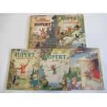 Five Rupert annuals comprising "A New Rupert Book", "More Adventures of Rupert", "The New Rupert