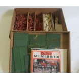 A PRMO Rubber Co. MiniBrix Building Set with interlocking rubber bricks contained in wooden box with