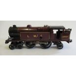 Hornby clockwork No 2 4-4-2 L.M.S. tank locomotive finished in red, 6954 to bunker, some paint